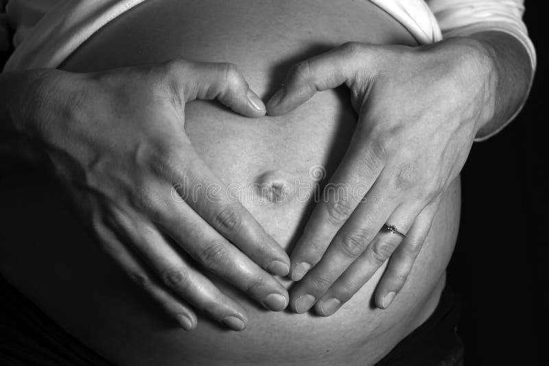 A pregnant woman in black and white. A pregnant woman in black and white