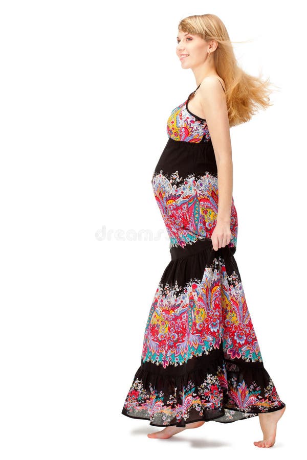 Zwangere vrouw die lange kleding draagt royalty-vrije stock foto's Zwangere vrouw die lange kleding draagt royalty-vrije stock foto's