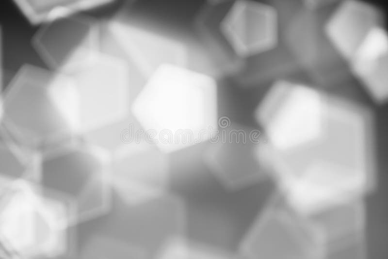 Abstracte zwart-wit achtergrond, wazige lichtbokeh royalty-vrije stock fotografie