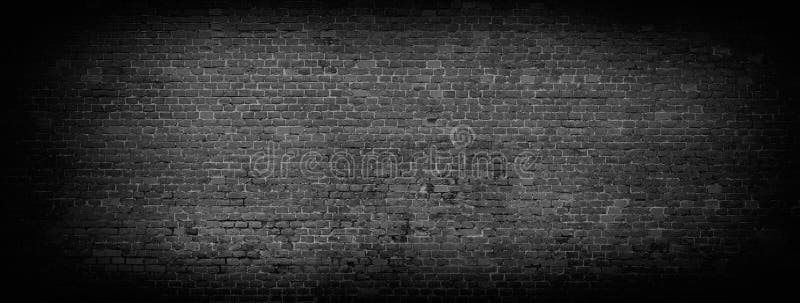 Black brick wall background. Wide high resolution panorama of brickwork. Black brick wall background. Wide high resolution panorama of brickwork