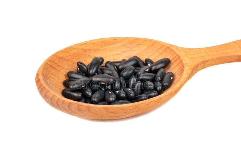 Zwarte bonen in lepel royalty-vrije stock afbeeldingen