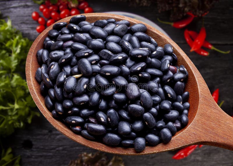 Zwarte bonen van peulvruchten stock afbeelding