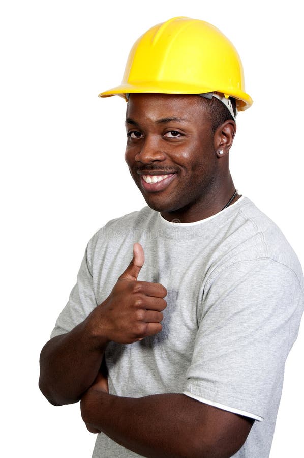 A black man African American Construction Worker on a job site. A black man African American Construction Worker on a job site.