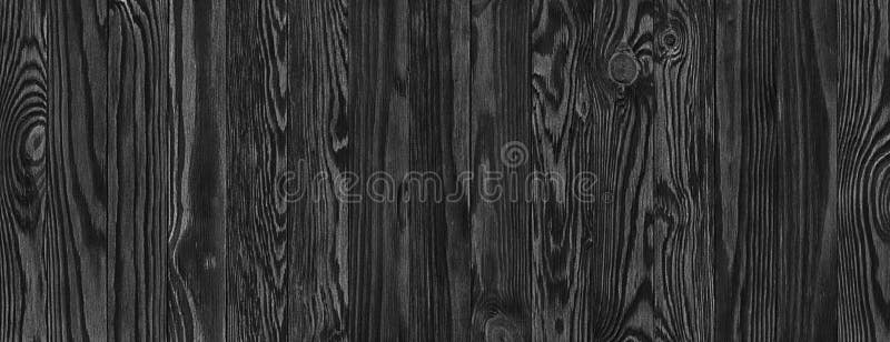 Zwarte houten planken, een panorama van de houten textuur met natuurlijk royalty-vrije stock afbeeldingen Zwarte houten planken, een panorama van de houten textuur met natuurlijk royalty-vrije stock afbeeldingen