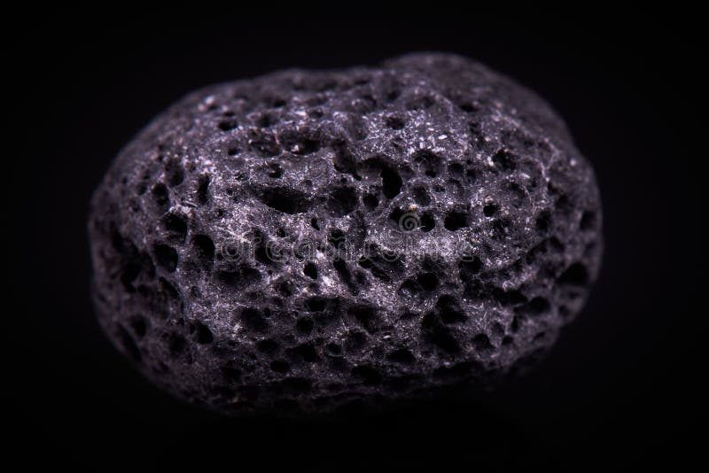 Zwarte poreuze basaltsteen royalty-vrije stock afbeeldingen