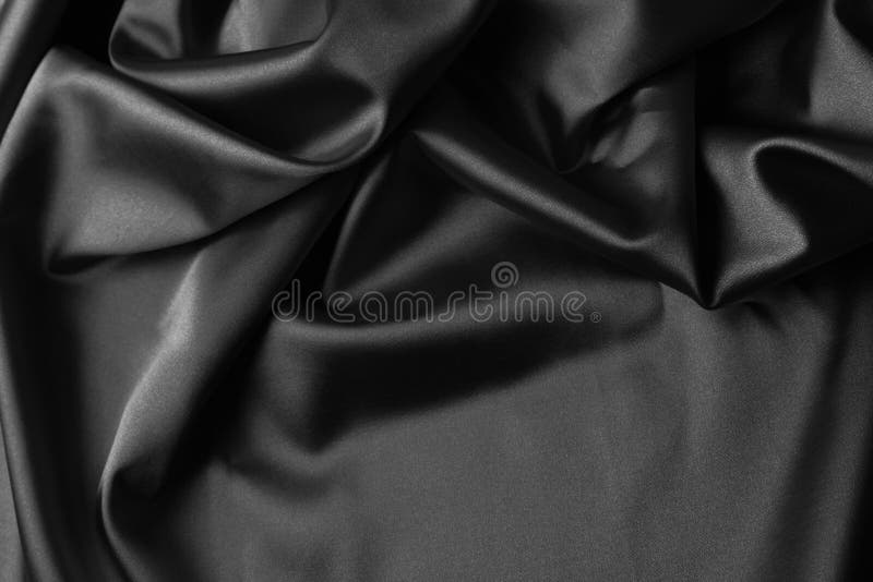 Closeup of rippled black silk fabric. Closeup of rippled black silk fabric