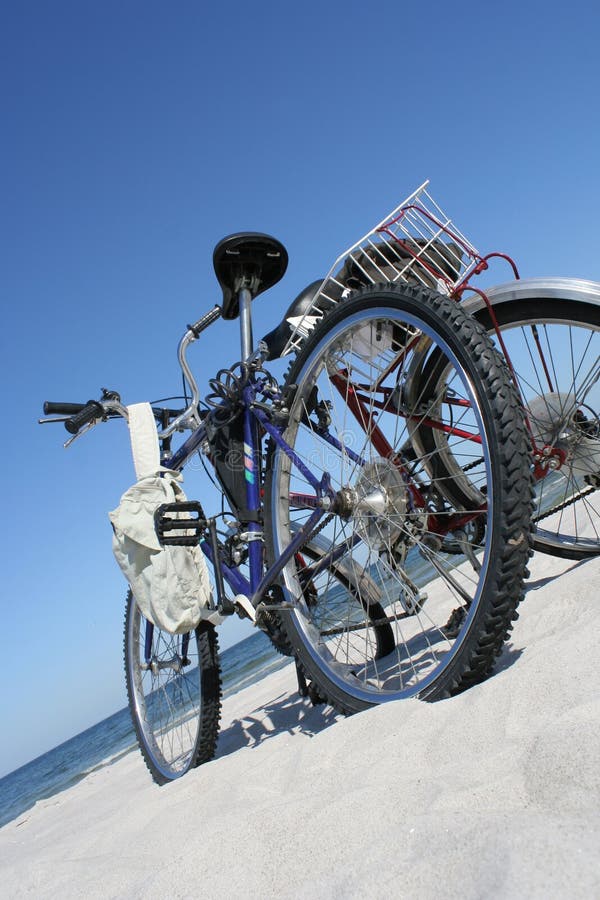 Two bicycles on a beach. Two bicycles on a beach