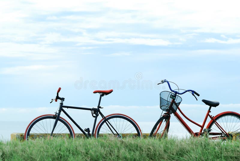 Two bicycles at blue sky. Two bicycles at blue sky.