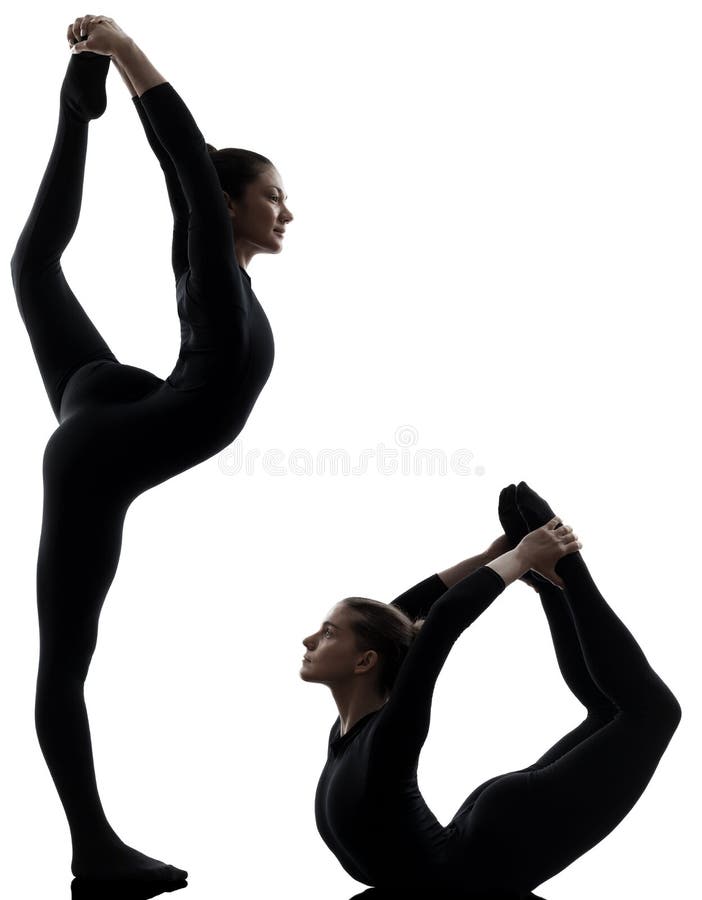 Zwei Frauen contorsionist, das gymnastisches Yogaschattenbild ausübt