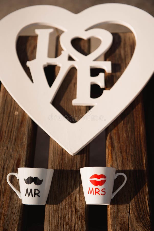 two coffee cups, decor for a photo shoot. two coffee cups, decor for a photo shoot