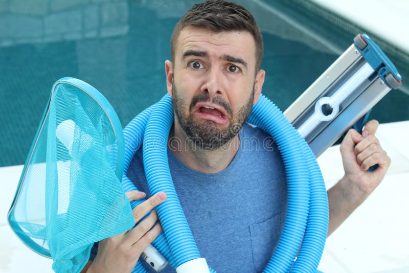 Stressed out janitor cleaning swimming pool. Stressed out janitor cleaning swimming pool.