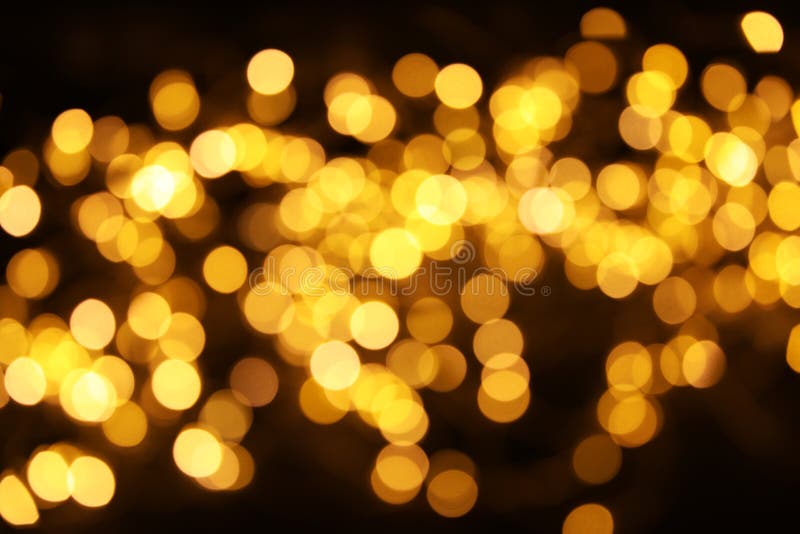 Złocista błyskotliwość z bokeh skutkiem fotografia stock