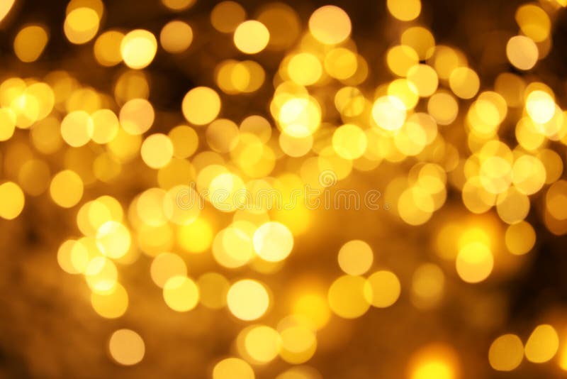 Złocista błyskotliwość z bokeh skutkiem fotografia royalty free