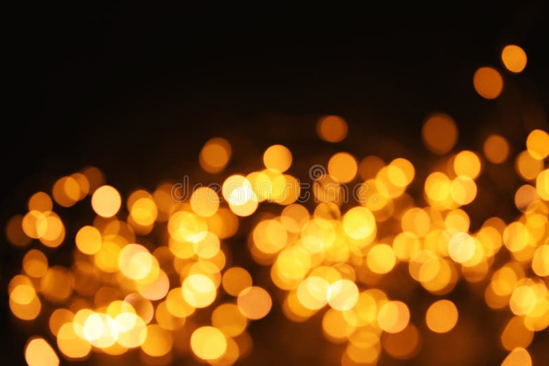 Złocista błyskotliwość z bokeh skutkiem fotografia stock