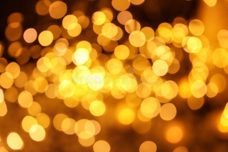 Złocista błyskotliwość z bokeh skutkiem obraz royalty free