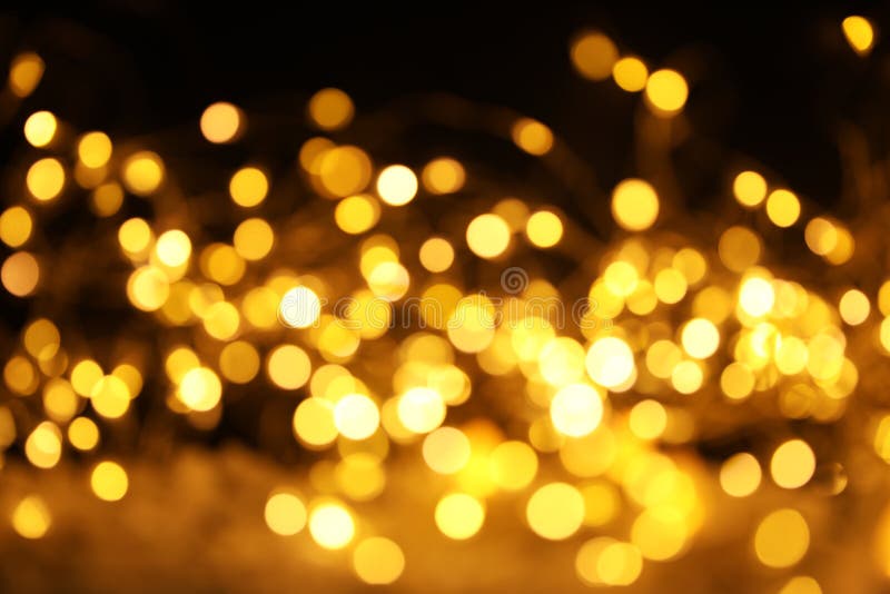 Złocista błyskotliwość z bokeh skutkiem obraz royalty free