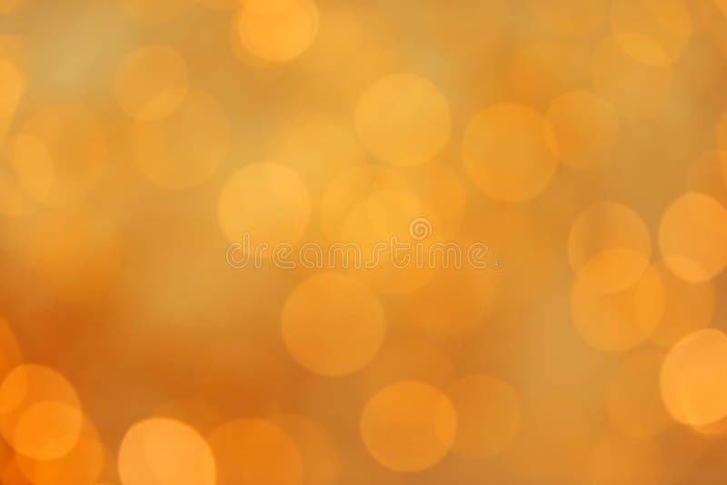 Złocista błyskotliwość z bokeh skutkiem zdjęcia stock
