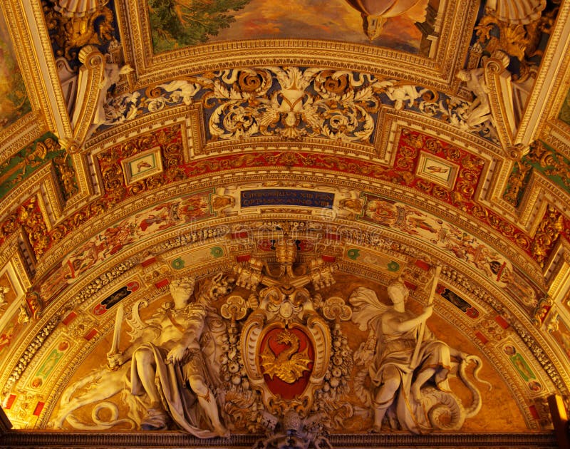 Golden decorations of church ceiling interior with religious theme. Vatican, Rome, Italy. EU. Golden decorations of church ceiling interior with religious theme. Vatican, Rome, Italy. EU