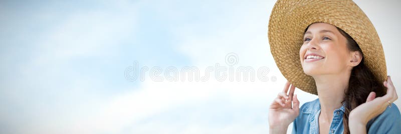 Portrait of beautiful blonde woman wearing hat against blue sky with clouds. Portrait of beautiful blonde woman wearing hat against blue sky with clouds