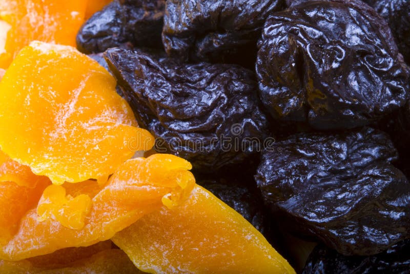 Collected different kinds of dried fruits: prunes, and mango. Collected different kinds of dried fruits: prunes, and mango