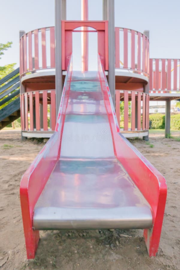 Child Sliding Down a Sliding Board. Stock Photo Image of person
