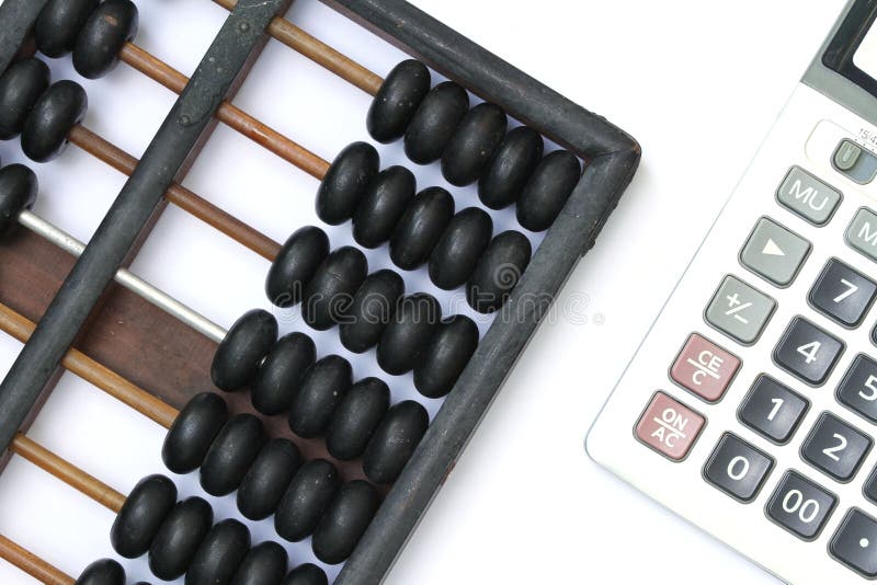 Ábaco chinês e calculadora antigos imagem de stock Ábaco chinês e calculadora antigos imagem de stock