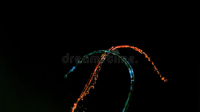 Água colorida em super câmara lenta a salpicar vídeos de arquivo