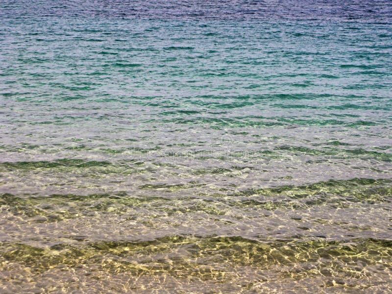 Água do mar com parte inferior arenosa imagens de stock Água do mar com parte inferior arenosa imagens de stock