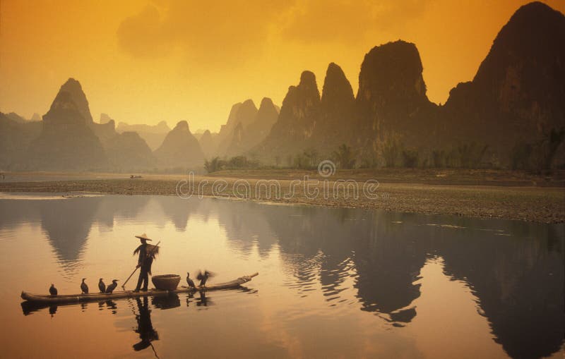 The landscape at the Li River near Yangshou near the city of Guilin in the Province of Guangxi in china in east asia. The landscape at the Li River near Yangshou near the city of Guilin in the Province of Guangxi in china in east asia.