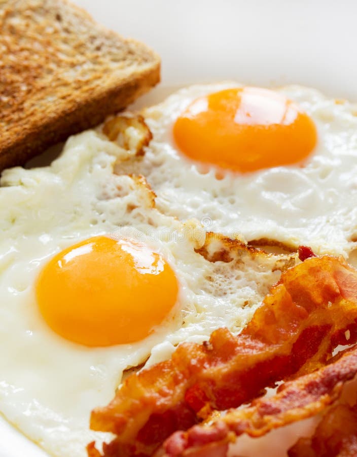 Ägg och bacon royaltyfri foto Ägg och bacon royaltyfri foto