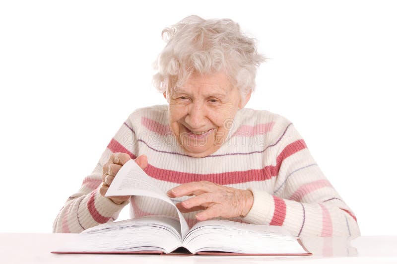 Ältere Frau liest das Buch lizenzfreie stockfotos Ältere Frau liest das Buch lizenzfreie stockfotos