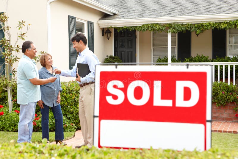 Happy senior Hispanic couple buying new home. Happy senior Hispanic couple buying new home