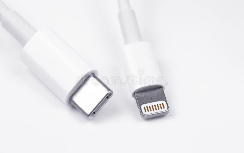 Apple Lightning to USB-C cable on the white background, macro. Apple is a multinational technology company. Moscow, Russia - September 15, 2020. Apple Lightning to USB-C cable on the white background, macro. Apple is a multinational technology company. Moscow, Russia - September 15, 2020