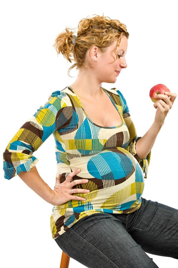 äpple som äter gravid kvinna arkivbild äpple som äter gravid kvinna arkivbild