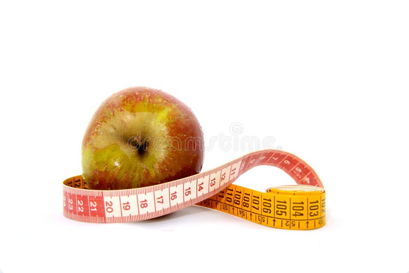 Apple with tape-measure on white background. Apple with tape-measure on white background