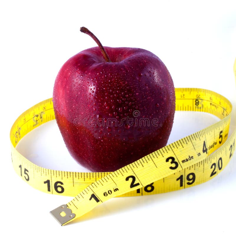 Red Apple and Tape Measure Depicting Weight Loss Concept. Red Apple and Tape Measure Depicting Weight Loss Concept