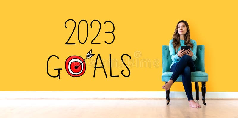 2023 års mål med unga kvinnor royaltyfria bilder