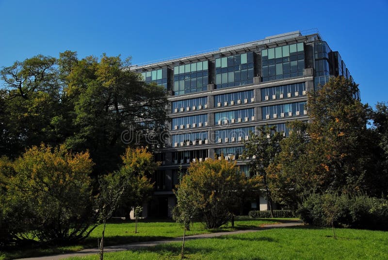 Warsaw Stock Exchange building -view from park side. Late summer time. Warsaw Stock Exchange building -view from park side. Late summer time.