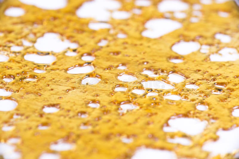 Éclat de concentré d'huile de cannabis aka images stock Éclat de concentré d'huile de cannabis aka images stock