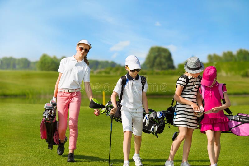 École de golf d'enfants photos libres de droits École de golf d'enfants photos libres de droits