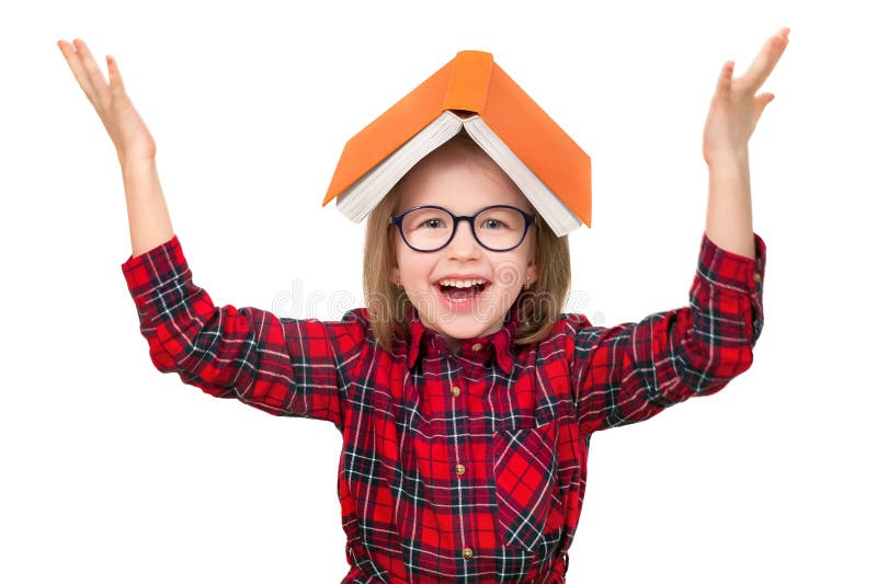 Écolière de Smilling dans des lunettes avec un livre images stock Écolière de Smilling dans des lunettes avec un livre images stock