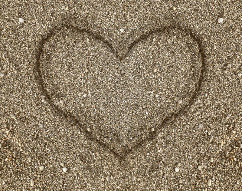 handwriting Heart of pebbles inlaid on a background of sand. Can be used as background. happy Valentines day idea. Valentine card. Heart shape drawn in the sand on a beach. handwriting Heart of pebbles inlaid on a background of sand. Can be used as background. happy Valentines day idea. Valentine card. Heart shape drawn in the sand on a beach