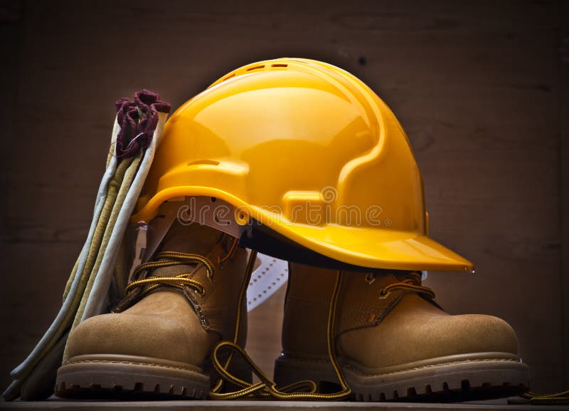 Protective work equipment. Gloves, helmet and boots. Protective work equipment. Gloves, helmet and boots.