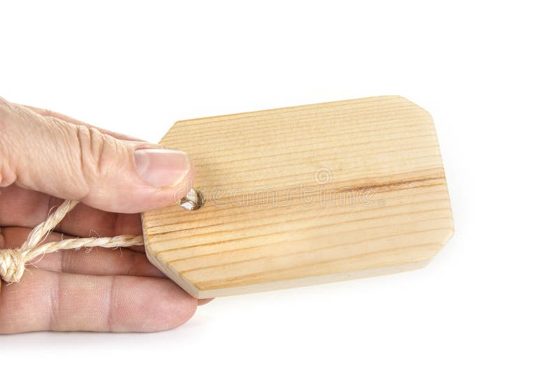Étiquette en bois avec de la ficelle sur un fond blanc photographie stock Étiquette en bois avec de la ficelle sur un fond blanc photographie stock