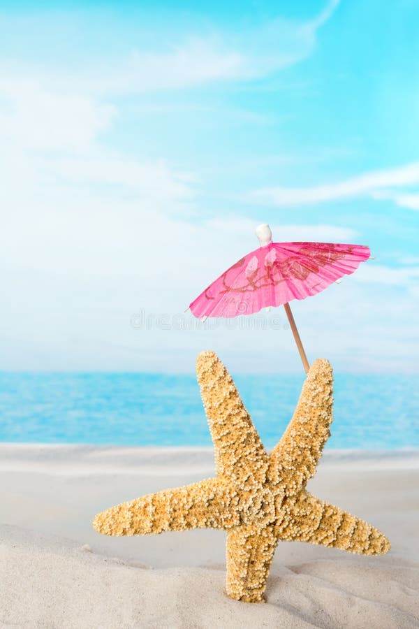 Beach image of one funny starfish holding a pink parasol. Beach image of one funny starfish holding a pink parasol