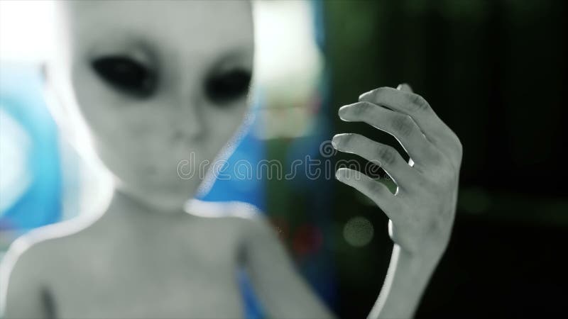 Étranger dans la chambre futuriste main atteignant avec la planète de la terre Concept futuriste d'UFO Animation 4k cinématograph