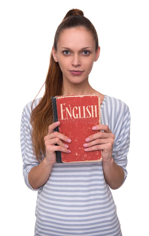 Étude du concept anglais Jolie fille tenant un livre photos libres de droits Étude du concept anglais Jolie fille tenant un livre photos libres de droits