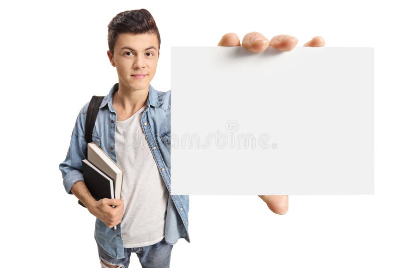 Étudiant adolescent montrant une carte vierge images stock Étudiant adolescent montrant une carte vierge images stock