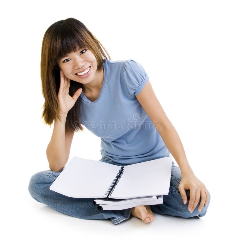 Asian student sitting on floor, blank book ready for text. Asian student sitting on floor, blank book ready for text.