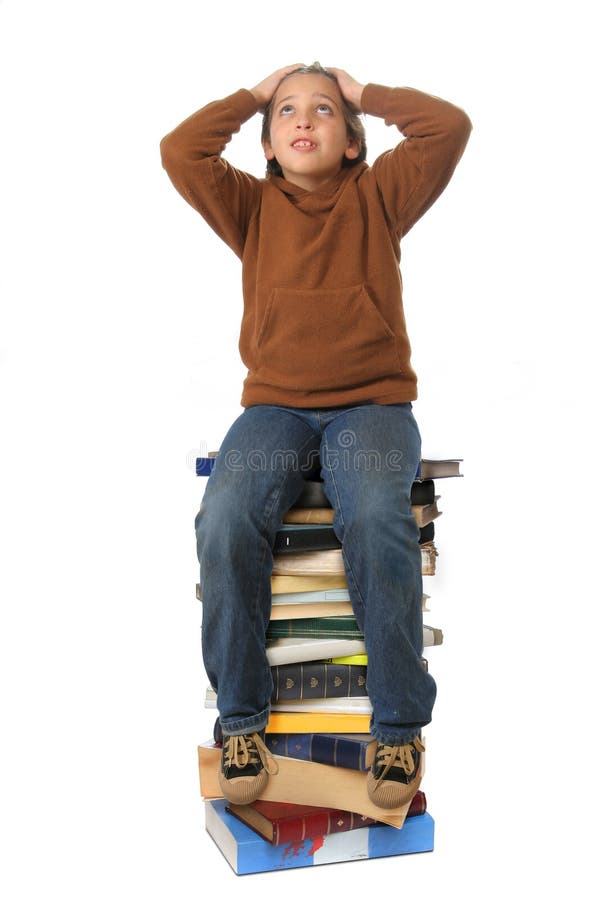 Boy sitting on a big pile of books. Different expressions (series). Boy sitting on a big pile of books. Different expressions (series)